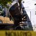 An excavator begins to tear apart a house at the intersection of Kingsley Street and First Street on Monday morning. Daniel Brenner I AnnArbor.com